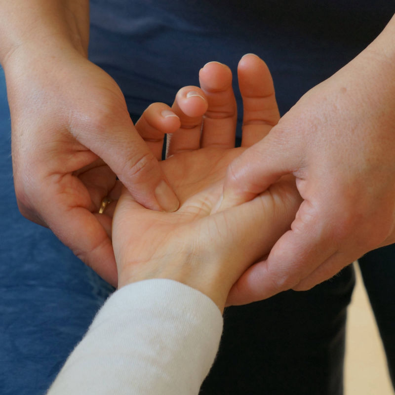 Shiatsu-Behandlung Hand